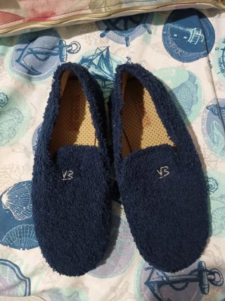 Zapatillas de casa de rizo azul