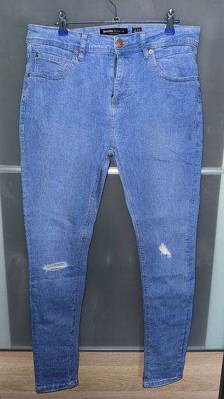Vaqueros Bershka Denim Azul Claro con Rotos