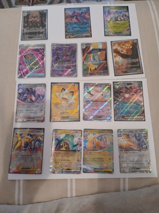 Lote de 12 Cartas Pokémon mas un album regalado