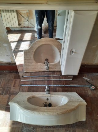 Mueble de baño con lavabo de mármol