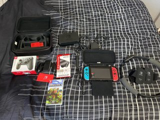Nintendo Switch con accesorios y juegos