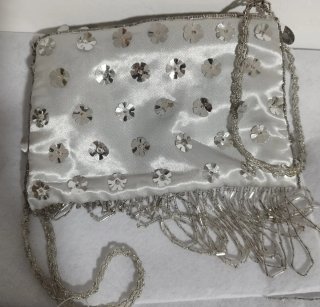 Bolso de fiesta plateado con lentejuelas