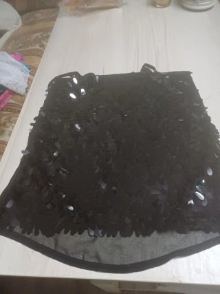 Camiseta de fiesta negra con lentejuelas