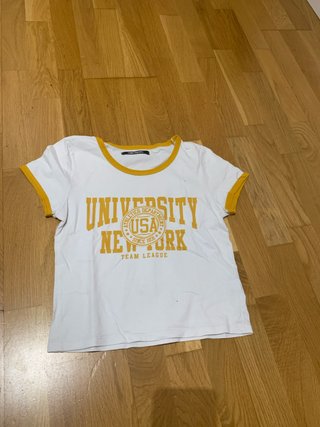 Camiseta Blanca y Amarilla University New York