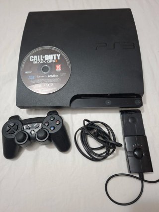 Título: PlayStation 3 Slim de 160 GB con accesorio