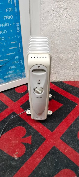 Radiador eléctrico de aceite...NORTLINE 1500W...