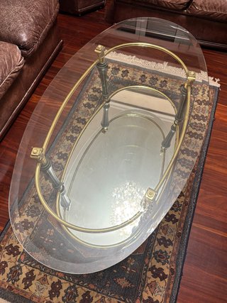 Mesa de centro ovalada de cristal y metal
