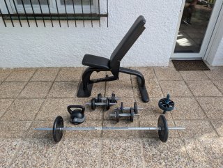 Set gimnasio con banco, pesas y barras