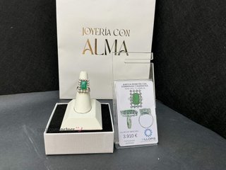 sortija oro 18k con piedra con diamante,esmeralda