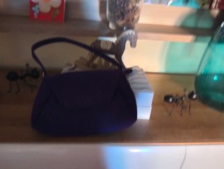 Bolso de terciopelo color morado