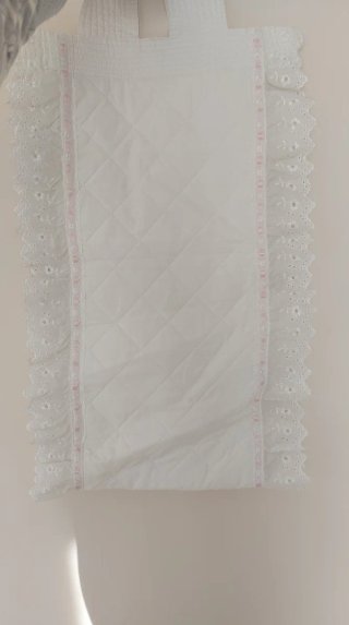Colgador de pañales blanco