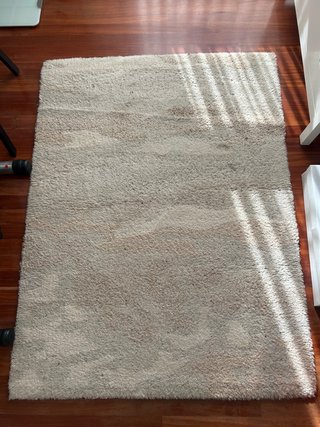 Alfombra de lana beige