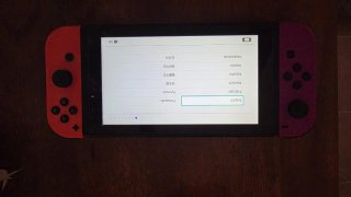 Nintendo Switch con Joy-Con Rojo y Morado