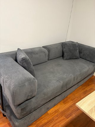 Sofá cama gris de pana