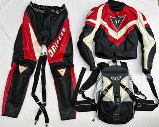 Mono moto Dainese Mujer, tirantes y mochila Berik