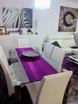 Conjunto de mesa de cristal y 6 sillas