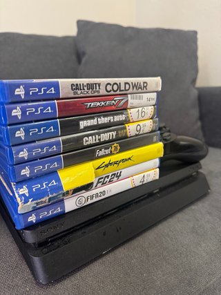 PS4 Slim 500GB + Mando y 8 Juegos