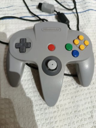 Mano. Joystick firme. Original. Nintendo 64