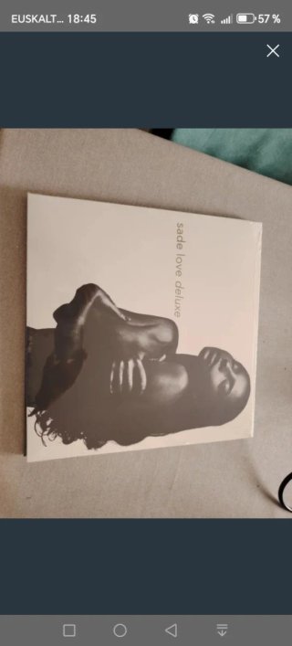 Disco de vinilo de Sade - Love Deluxe.