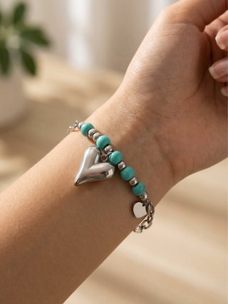 Pulsera de Acero Plateada con Corazones