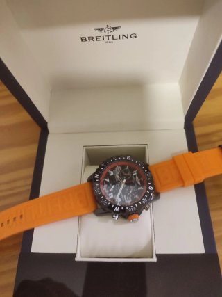 Reloj Breitling con correa naranja