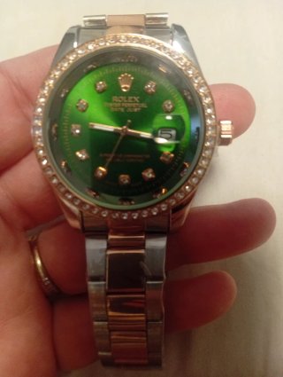 Reloj Verde y Dorado