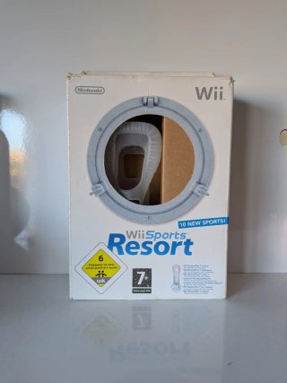 Caja Wii Sports Resort y funda del mando