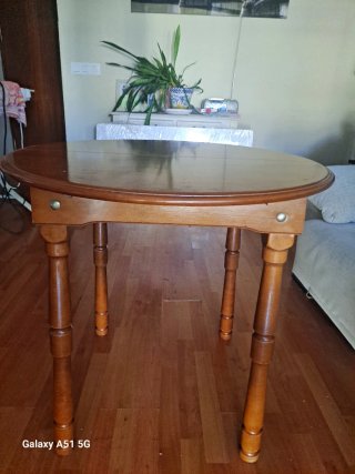 Mesa camilla extensible con cristal.