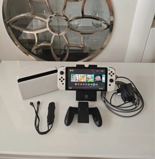 Nintendo Switch OLED blanca + juegos + accesorios