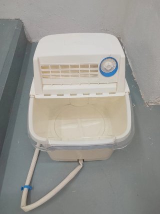 Lavadora portátil Jata antigua