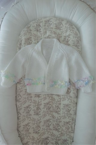 Chaqueta de lana blanca para bebé