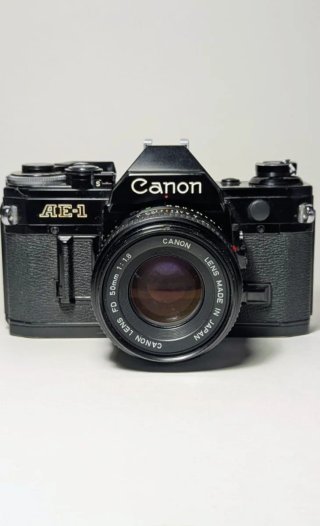 Canon AE-1 + 50mm 1.8 cámara de 35mm