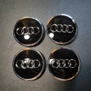 TAPABUJES AUDI 61mm NEGRO - EMBLEMA LLANTAS AUDI