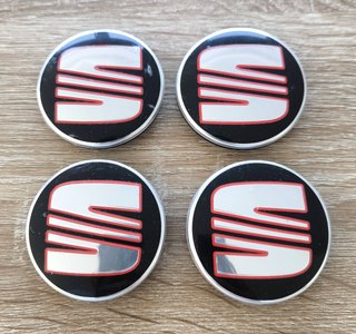 TAPABUJES SEAT 56mm NEGROS CON EMBLEMA PLATA ROJO