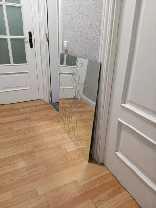 Espejo con grabado de Pluto