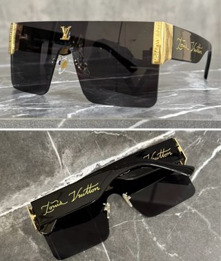 Gafas de sol Louis Vuitton negras y doradas