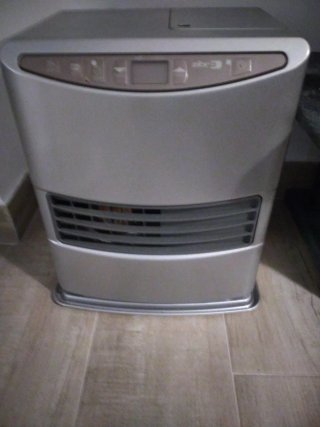 Estufa Toyotomi Parafina y Eléctrica