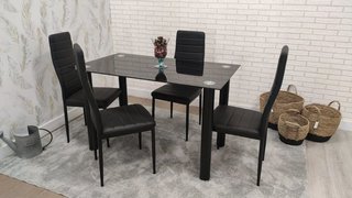 Mesa de comedor de cristal con 4 sillas NUEVO