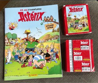 Álbum y 50 Sobres de Cromos Astérix 65 Años