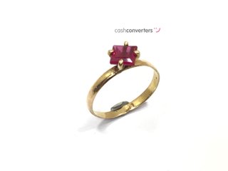 anillo oro 18k con piedra con rubi