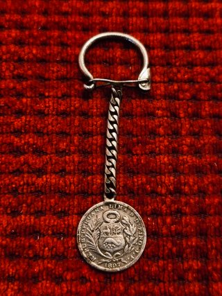 Llavero plata de ley moneda peruana 1897