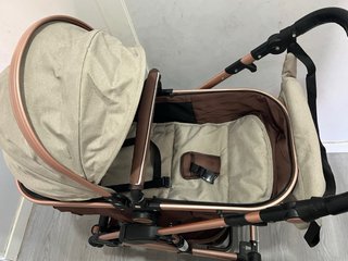 Vendo carrito de bebé KIDUKU 2 en 1, en tonos beig