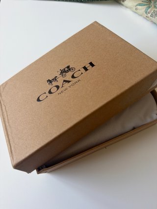Cartera Coach