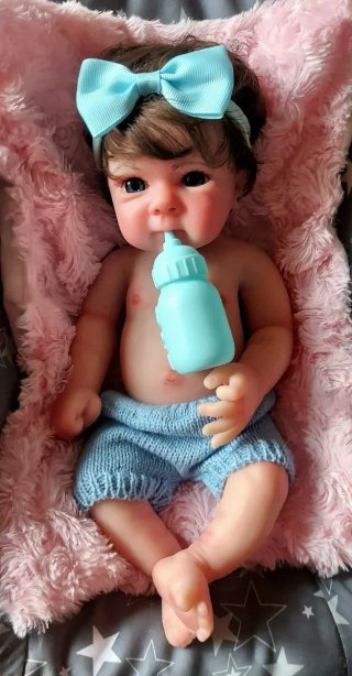 Muñeca reborn silicona con pelo