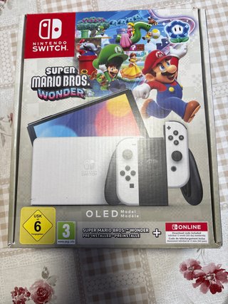 Nintendo Switch OLED + Nintendo Switch Sports