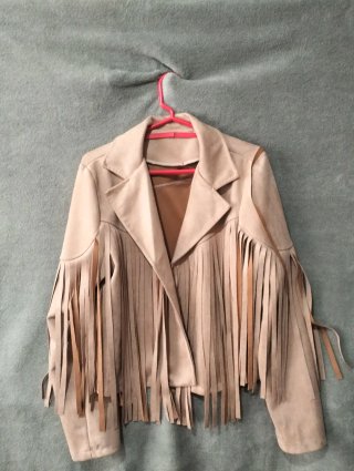 Cazadora con flecos beige