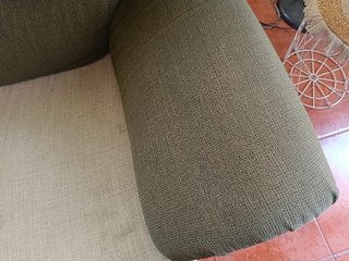 Sofá de tela bicolor la parte verde se limpia