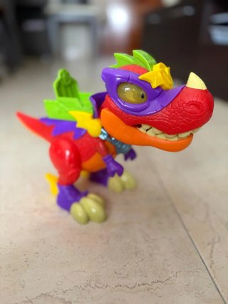 Figura SuperThings Dinosaurio y lote de vehículos