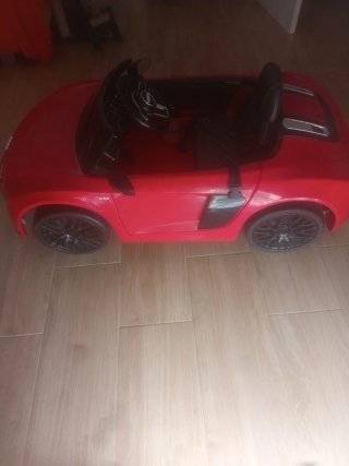 Coche eléctrico infantil rojo