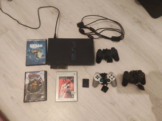 Consola PlayStation 2 (PS2) con accesorios
